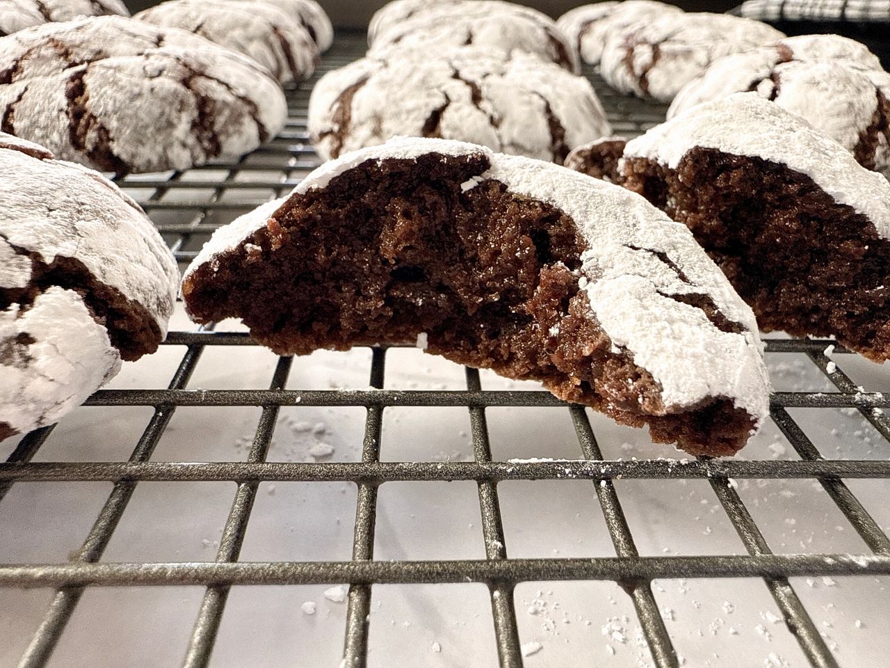 Chocolate Crinkle Cookies on a wire rack