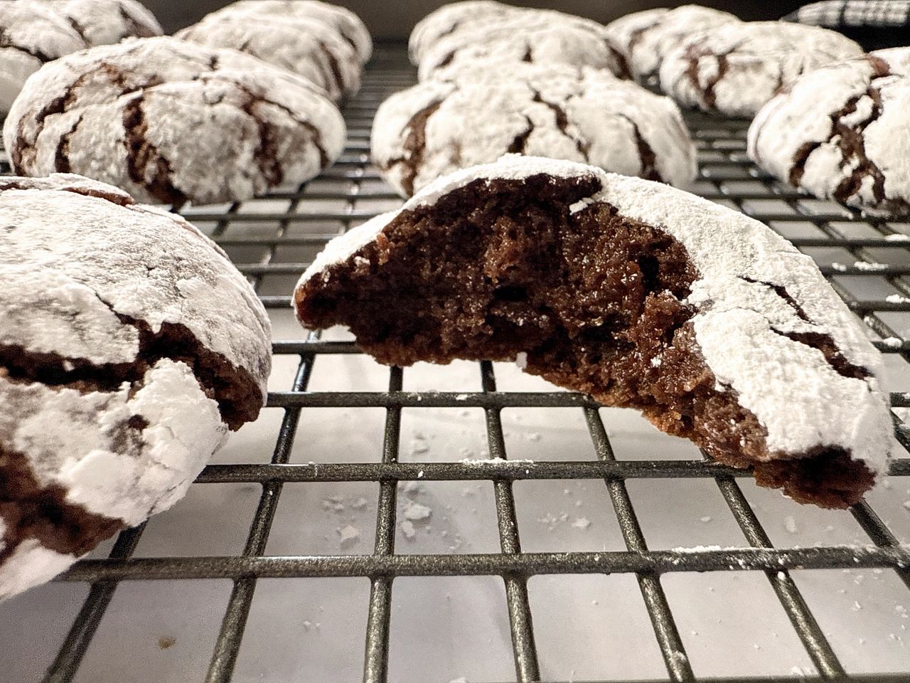 chocolate crinkle cookies on a wire rack