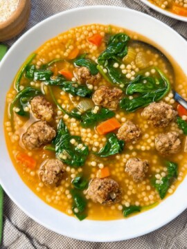Italian Wedding Soup in a white bowl