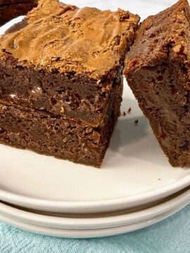 chocolate brownies on white plates