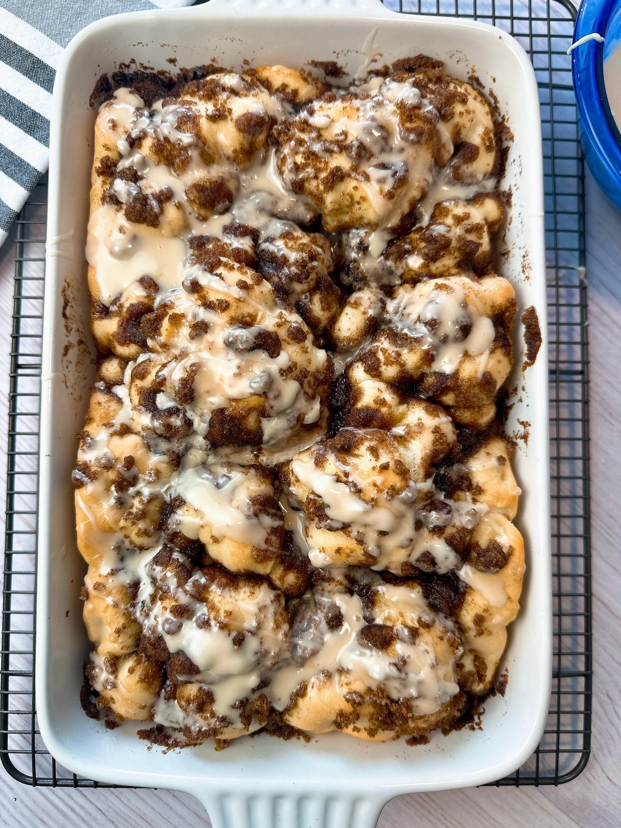 cinnamon roll focaccia in a white baking dish