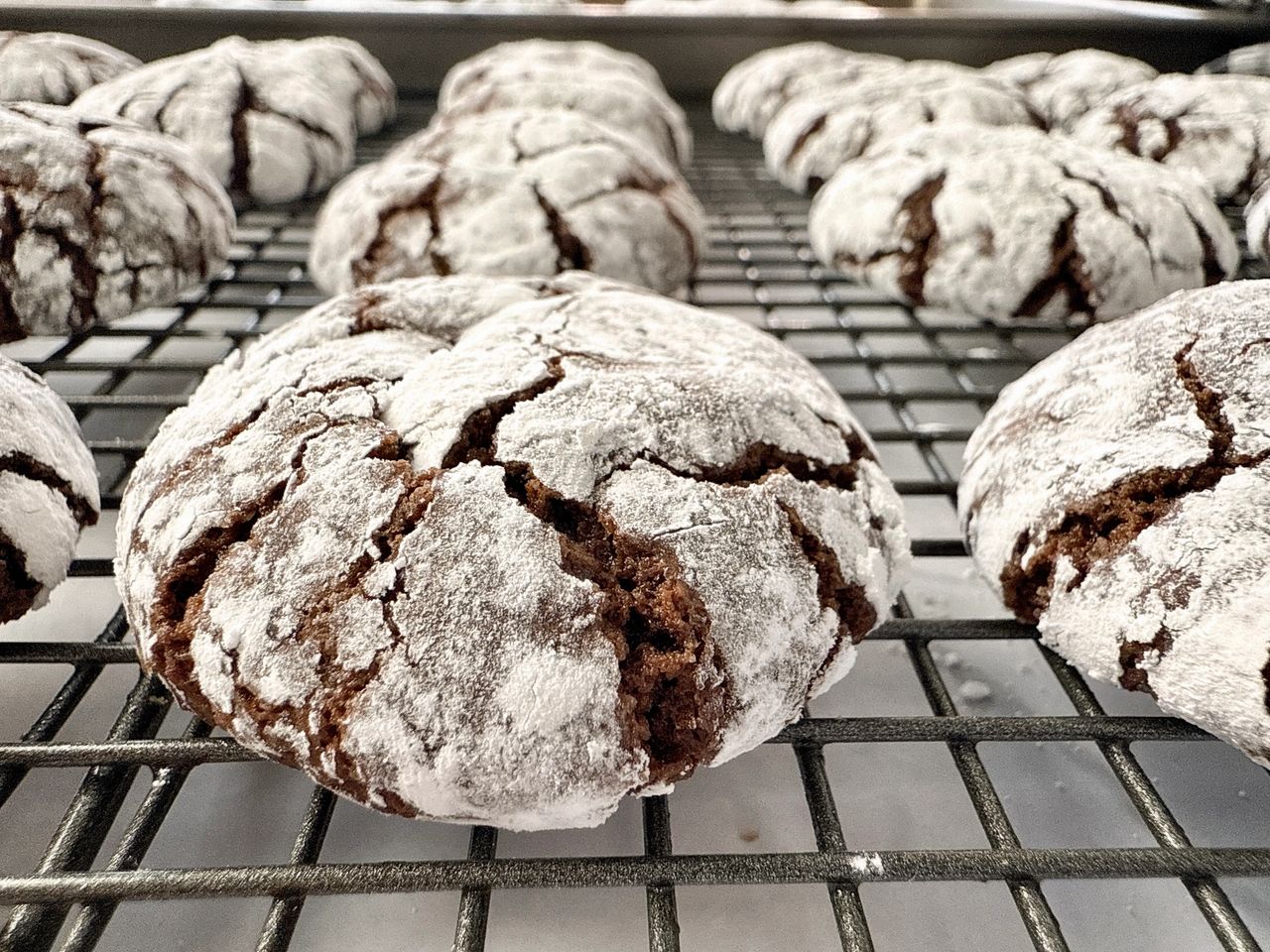 chocolate crinkle cookies on a wire rack