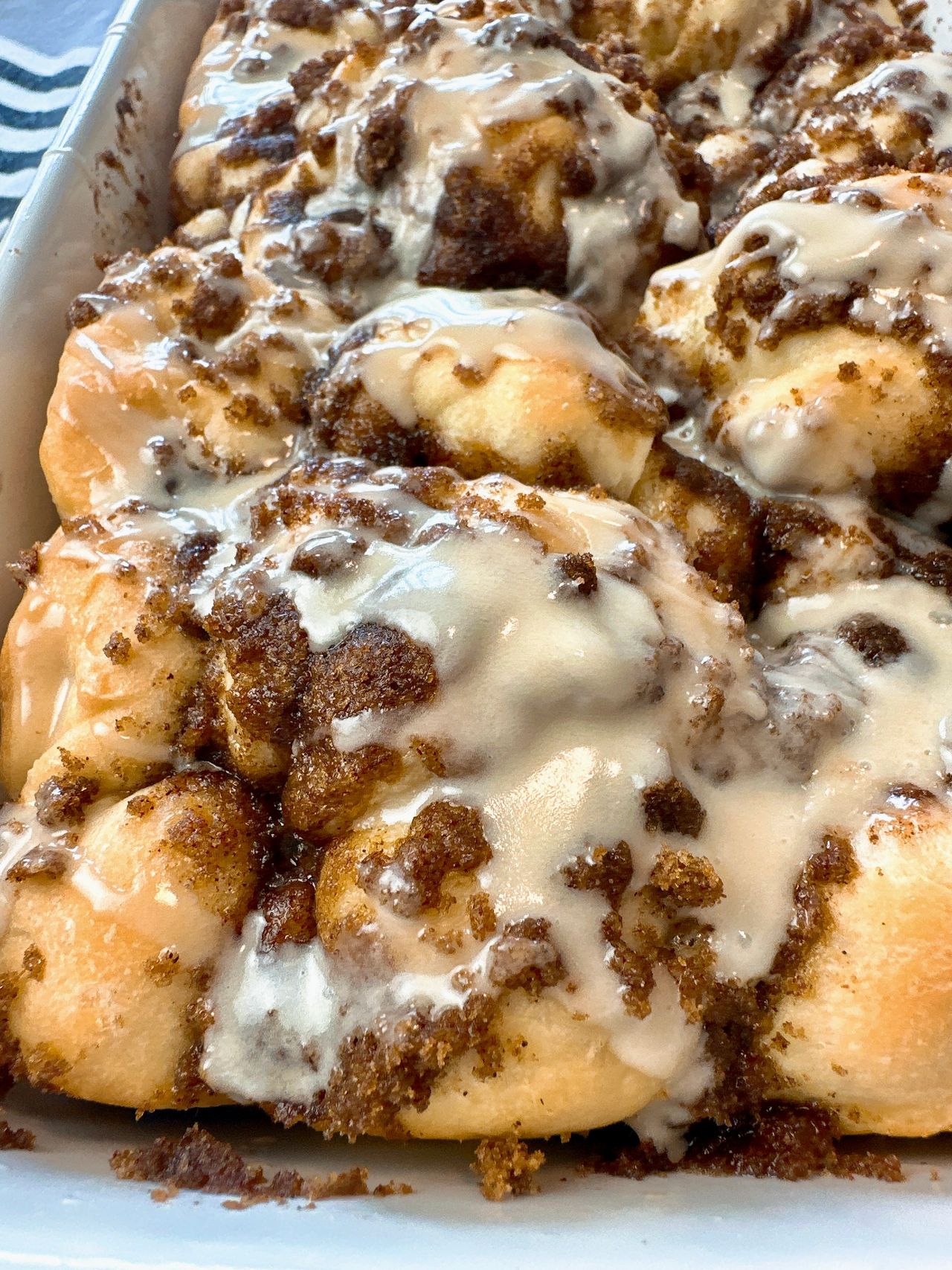cinnamon roll focaccia in a white baking dish