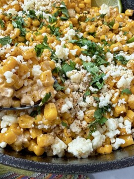 Mexican street corn in a cast iron skillet