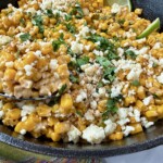 Mexican street corn in a cast iron skillet