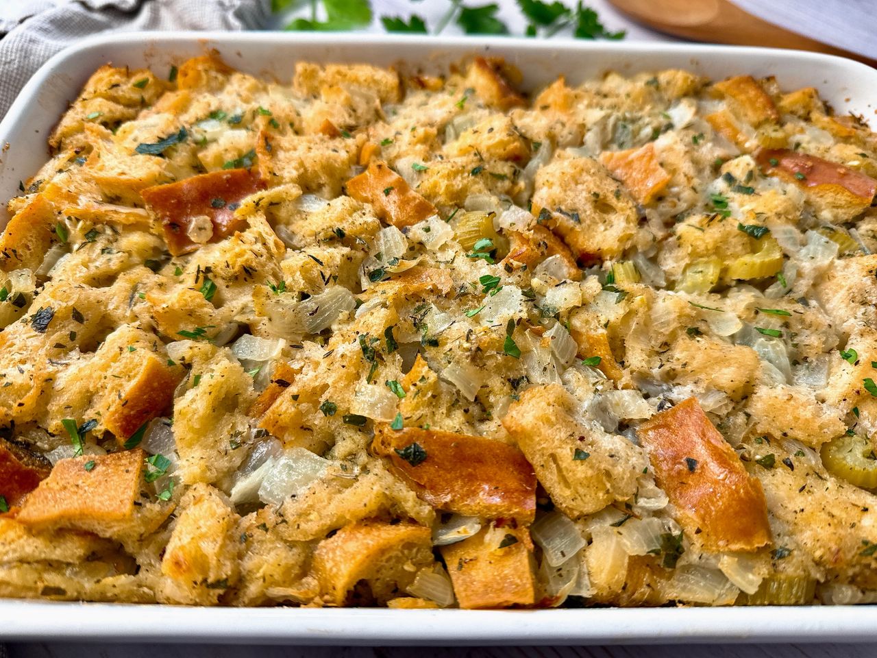 Herb Butter Stuffing in a white baking dish