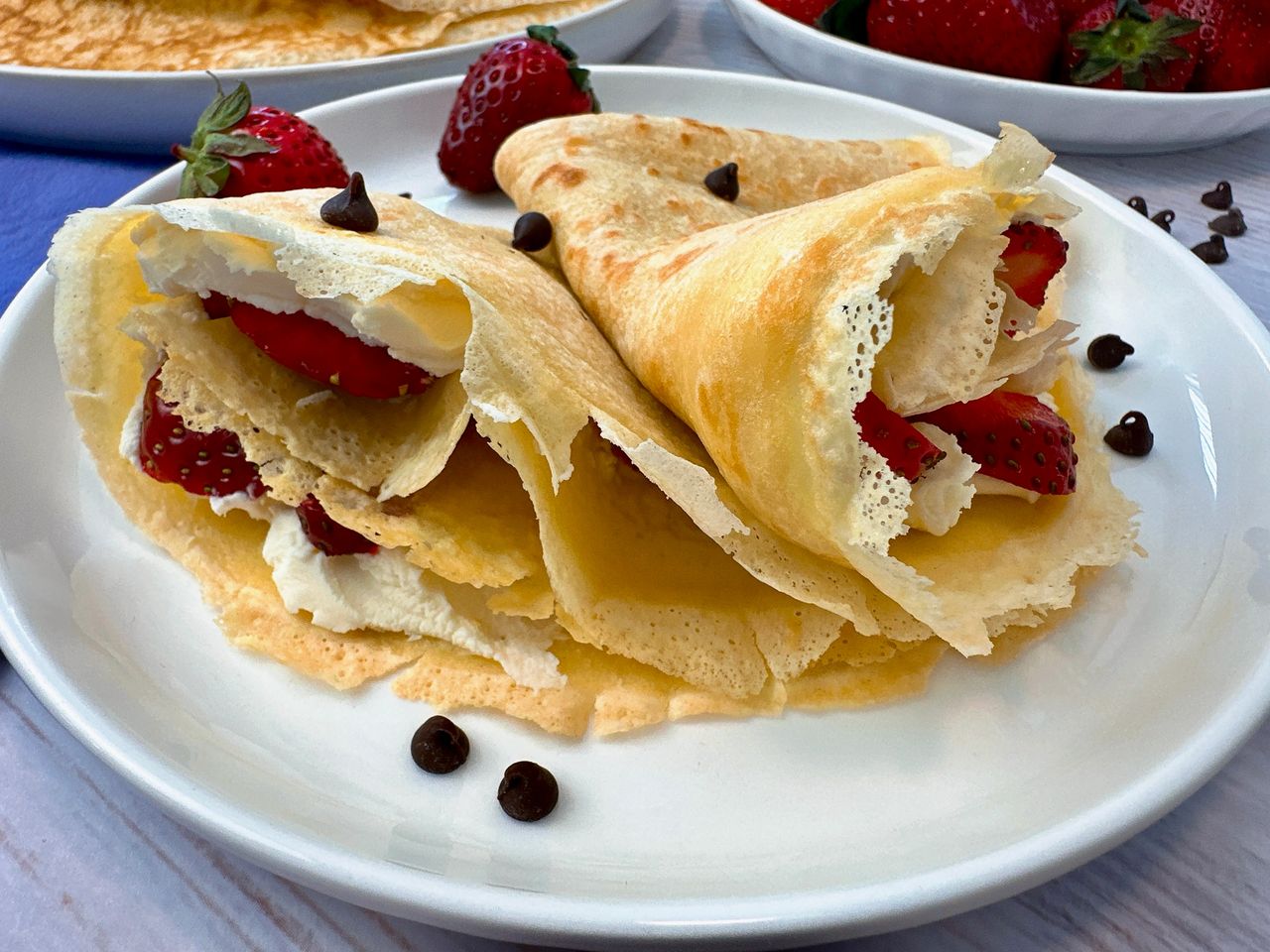 Ultimate Crepes Crepes filled with mascarpone cheese and served with strawberries