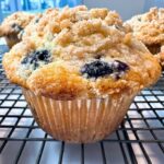 Blueberry muffins on a wire rack