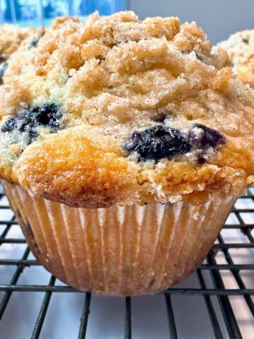 Blueberry muffins on a wire rack