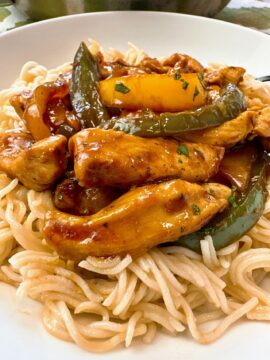 chicken stir fry over asian noodles