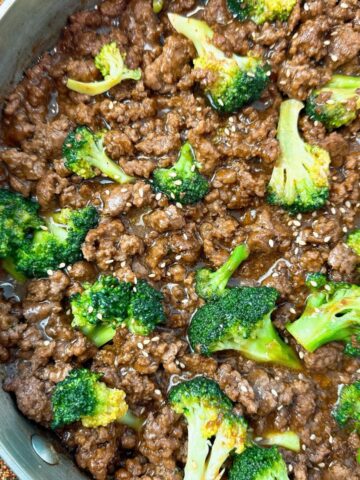 beef and broccoli in a skillet
