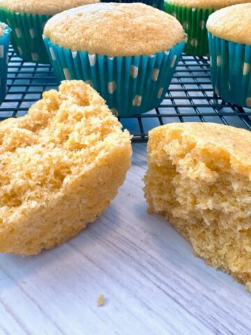 cornbread muffins on a wire rack and white counter