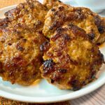 sausage patties on a white plate