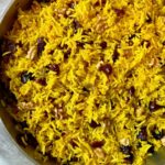 rice pilaf with cranberries in a skillet