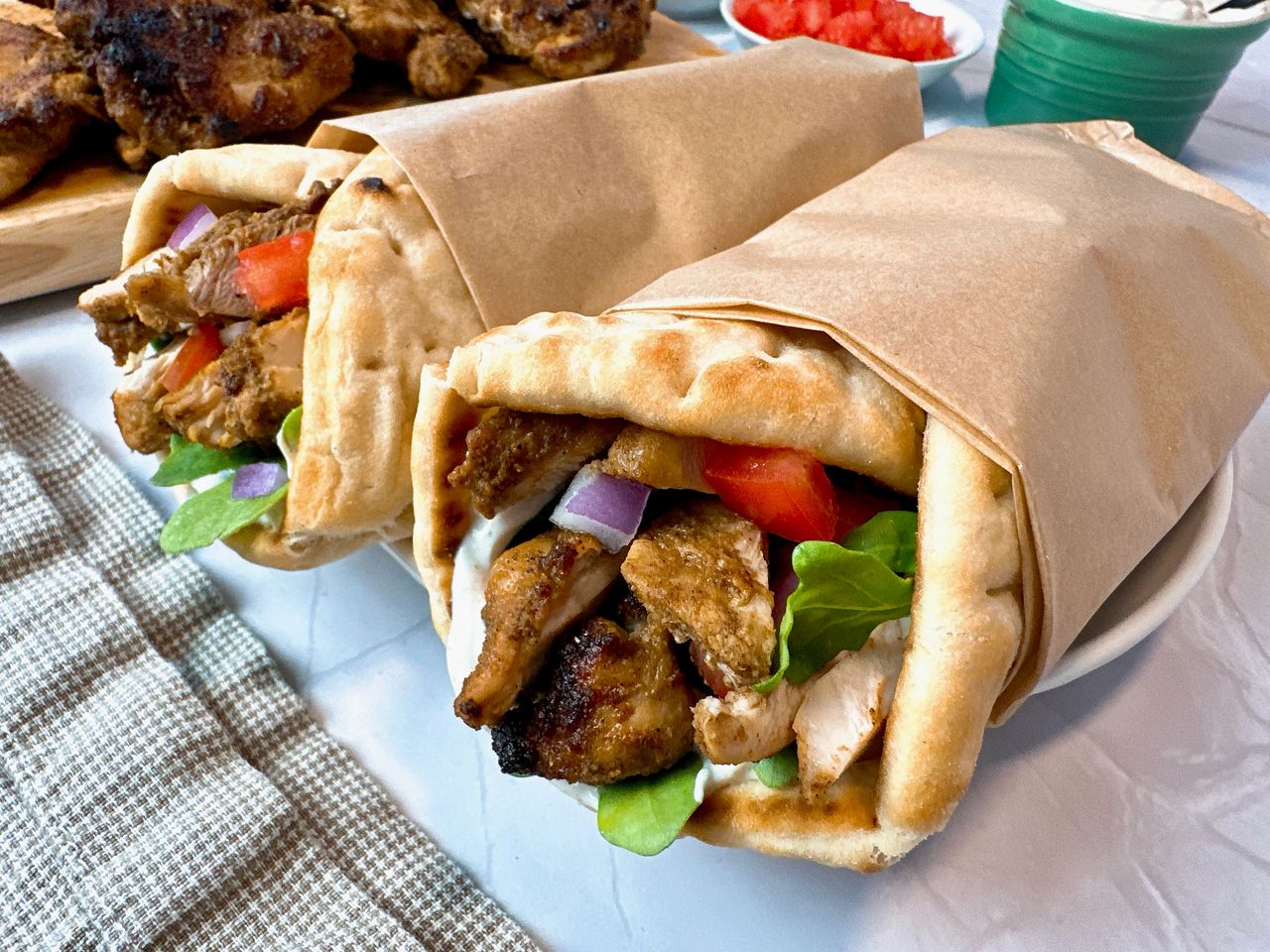 Chicken Shawarma chicken shawarma wraps on a white plate