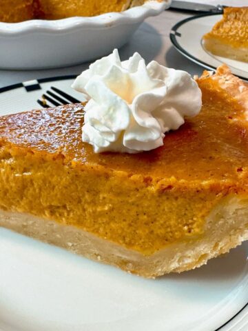 slice of pumpkin pie on a plate