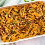 pasta and beef in a white baking dish