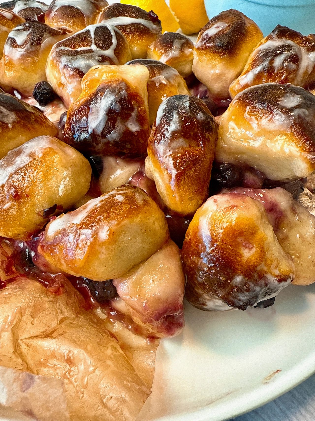 lemon blueberry pull apart bread on a plate