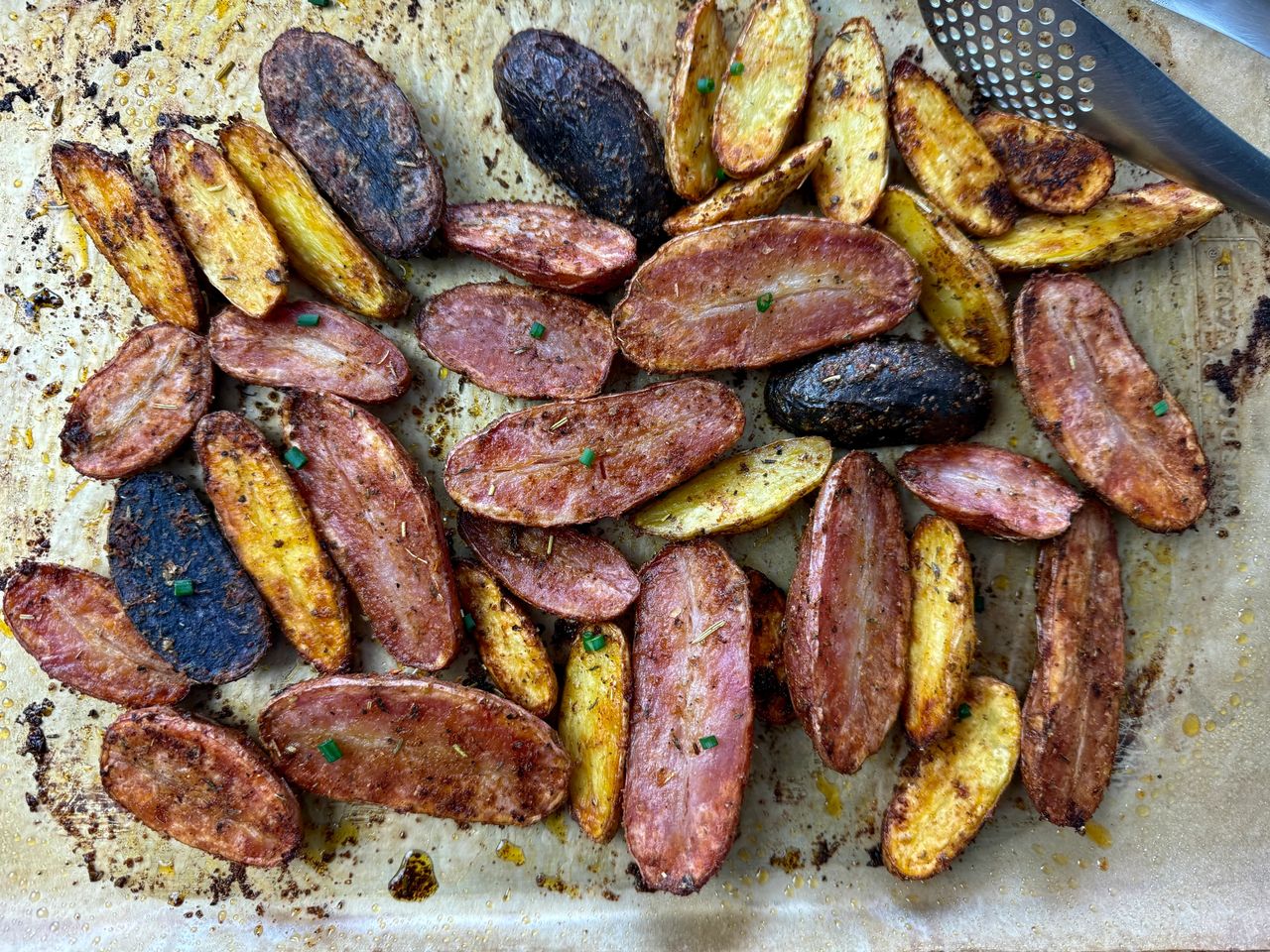 roasted fingerling potatoes on a baking sheet