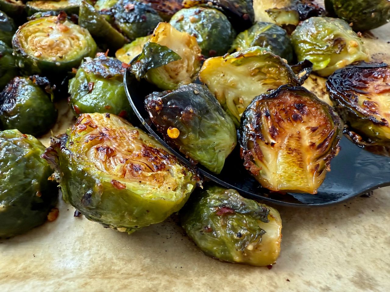 roasted brussels sprouts on parchment paper