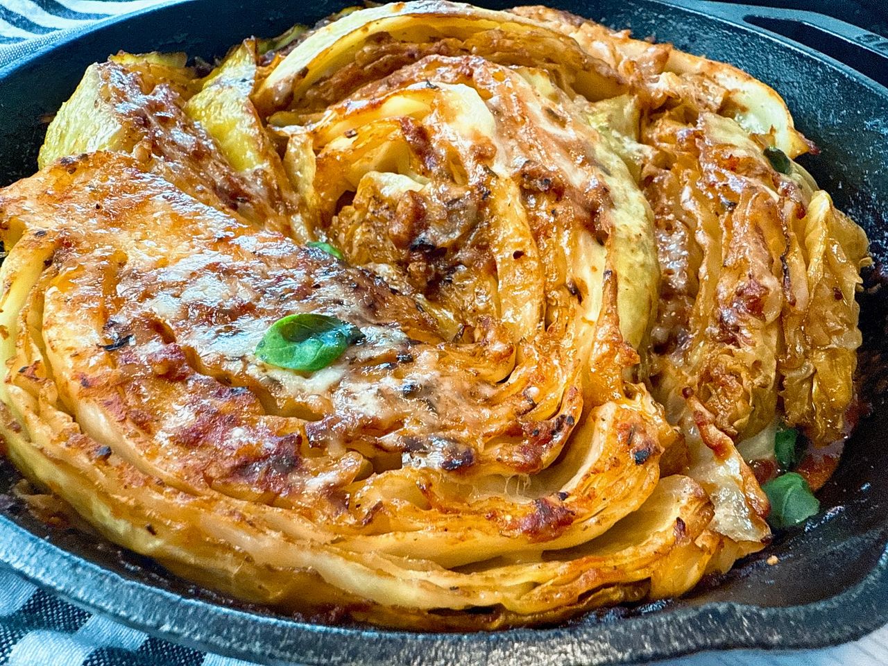 Melting Cabbage Marinara Melting Cabbage Marinara in a cast iron skillet