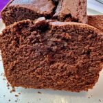 chocolate loaf cake slices on a white plate