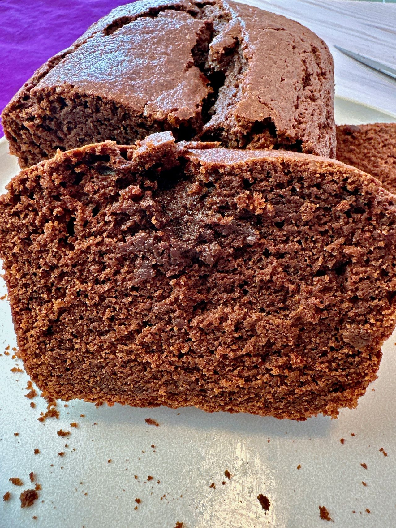 chocolate loaf cake slices on a white plate