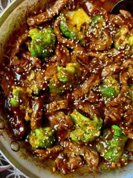 beef and broccoli in a skillet