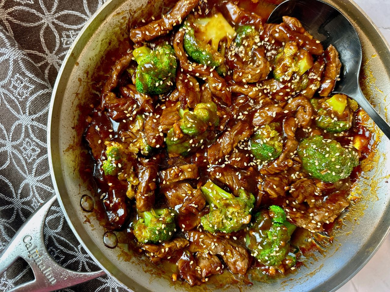 beef and broccoli in a skillet