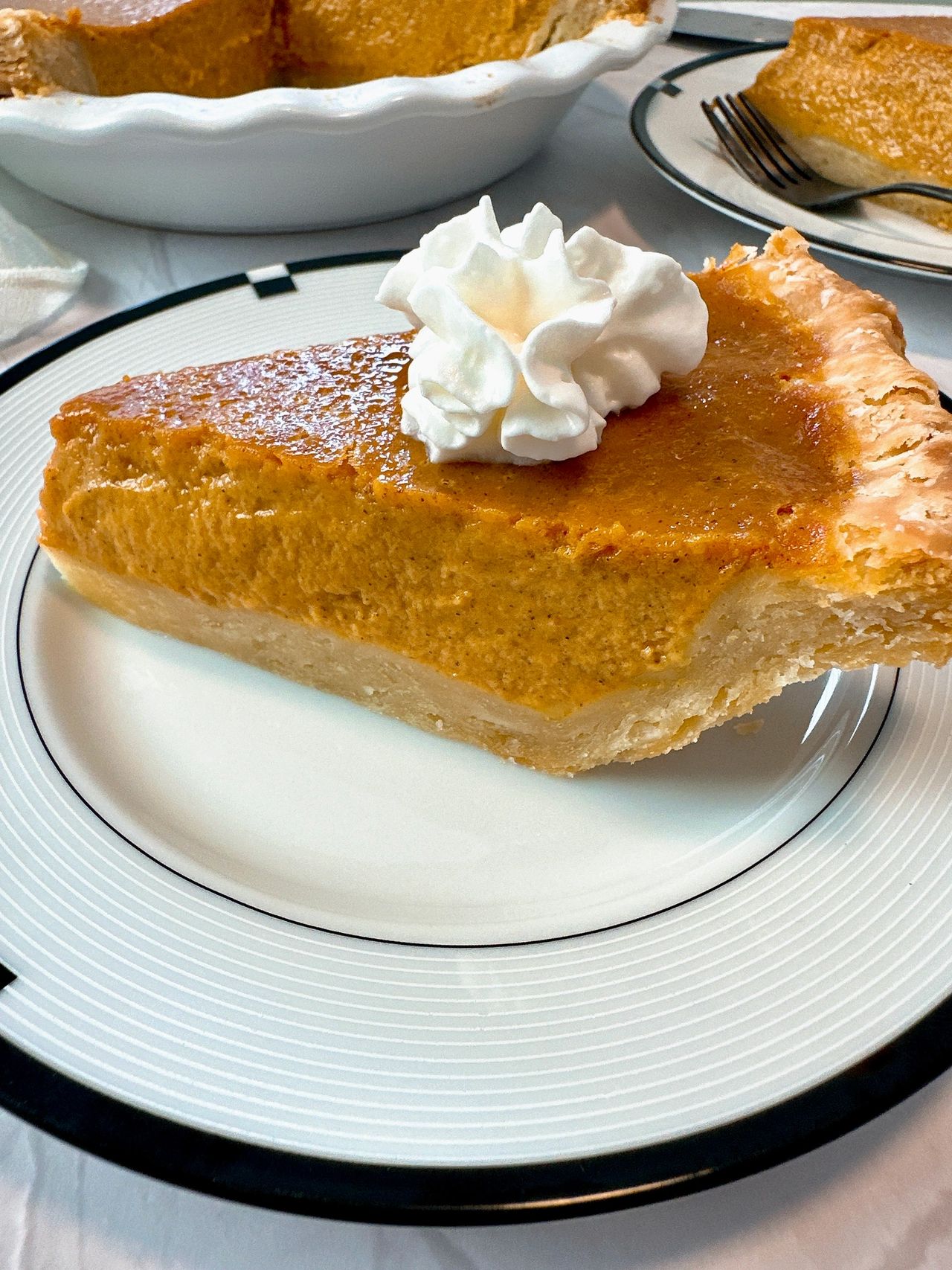 slice of pumpkin pie on a plate