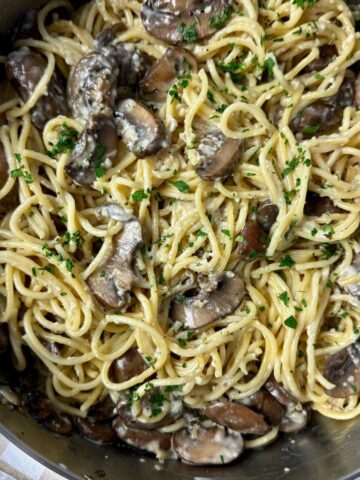 pasta with mushrooms in a skillet