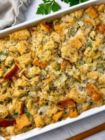 stuffing in a white baking dish