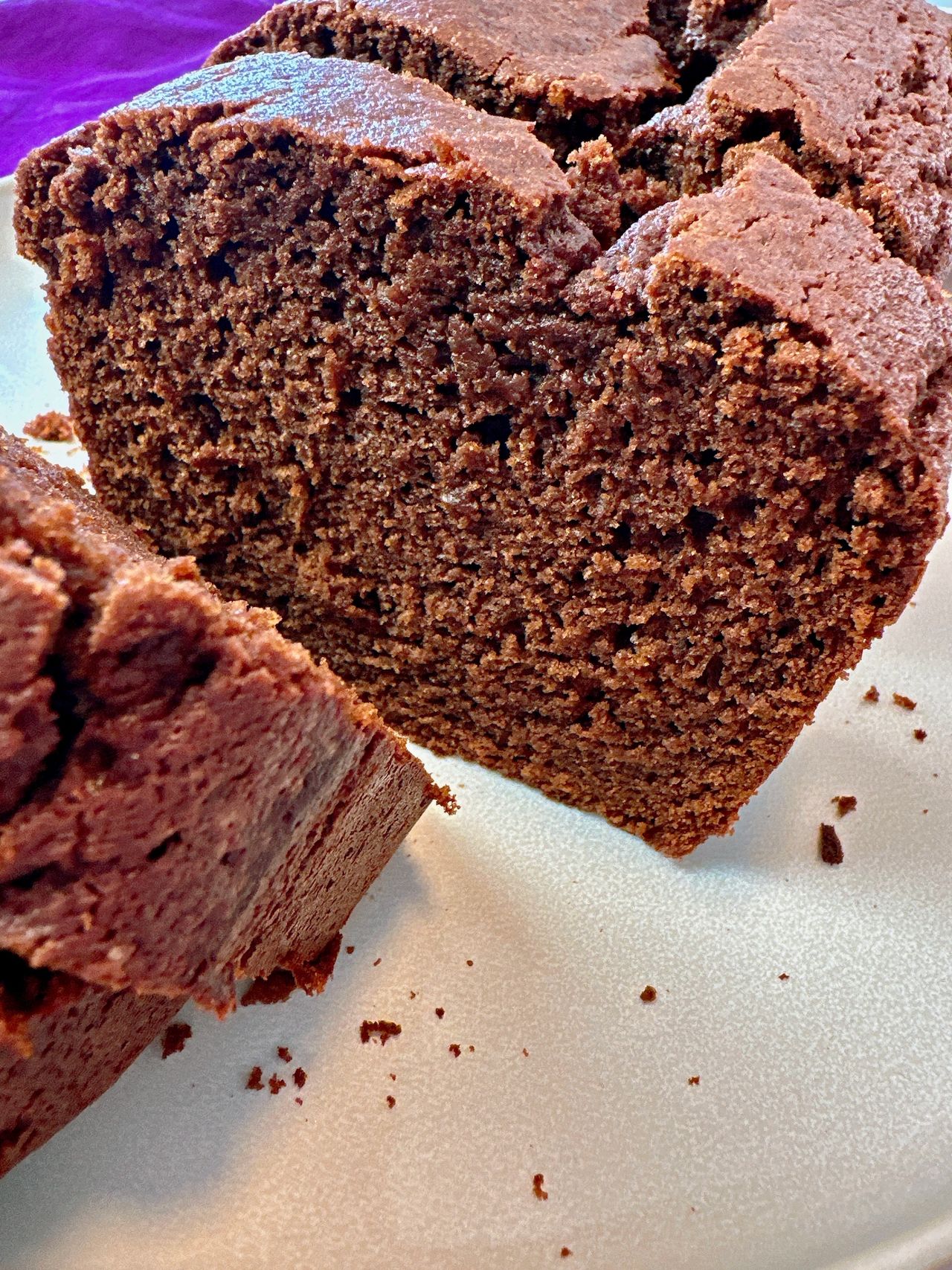 chocolate loaf cake slices on a white plate