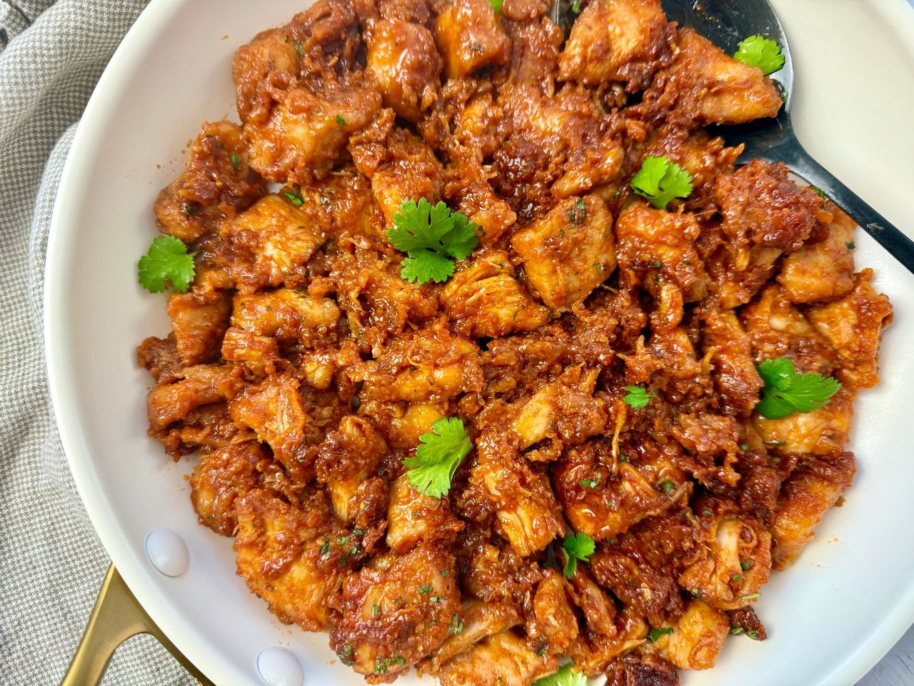 Gochujang Chicken gochujang chicken in a white skillet