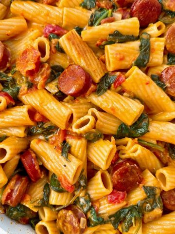rigatoni with chorizo in a white skillet
