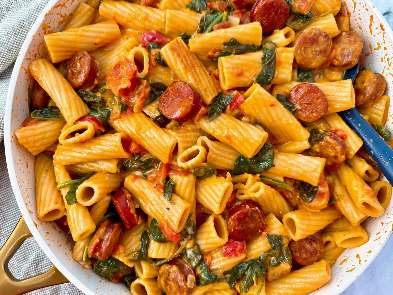 rigatoni with chorizo in a white skillet