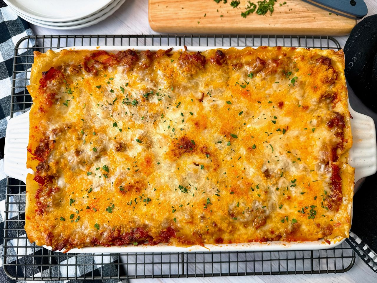 lasagna in a white baking dish