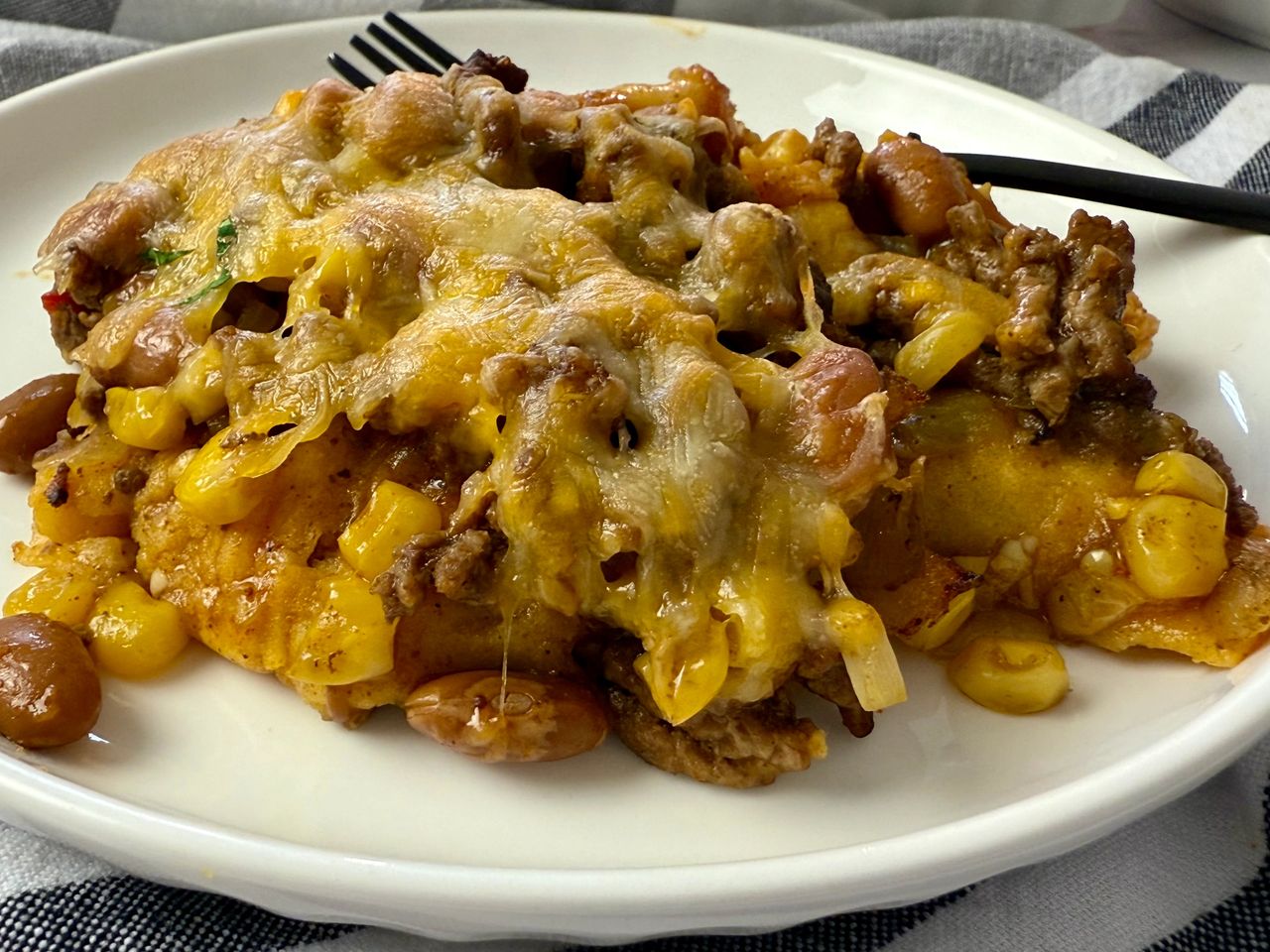 enchilada casserole on a white plate
