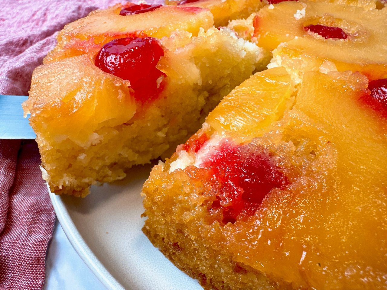pineapple upside cake on a white plate
