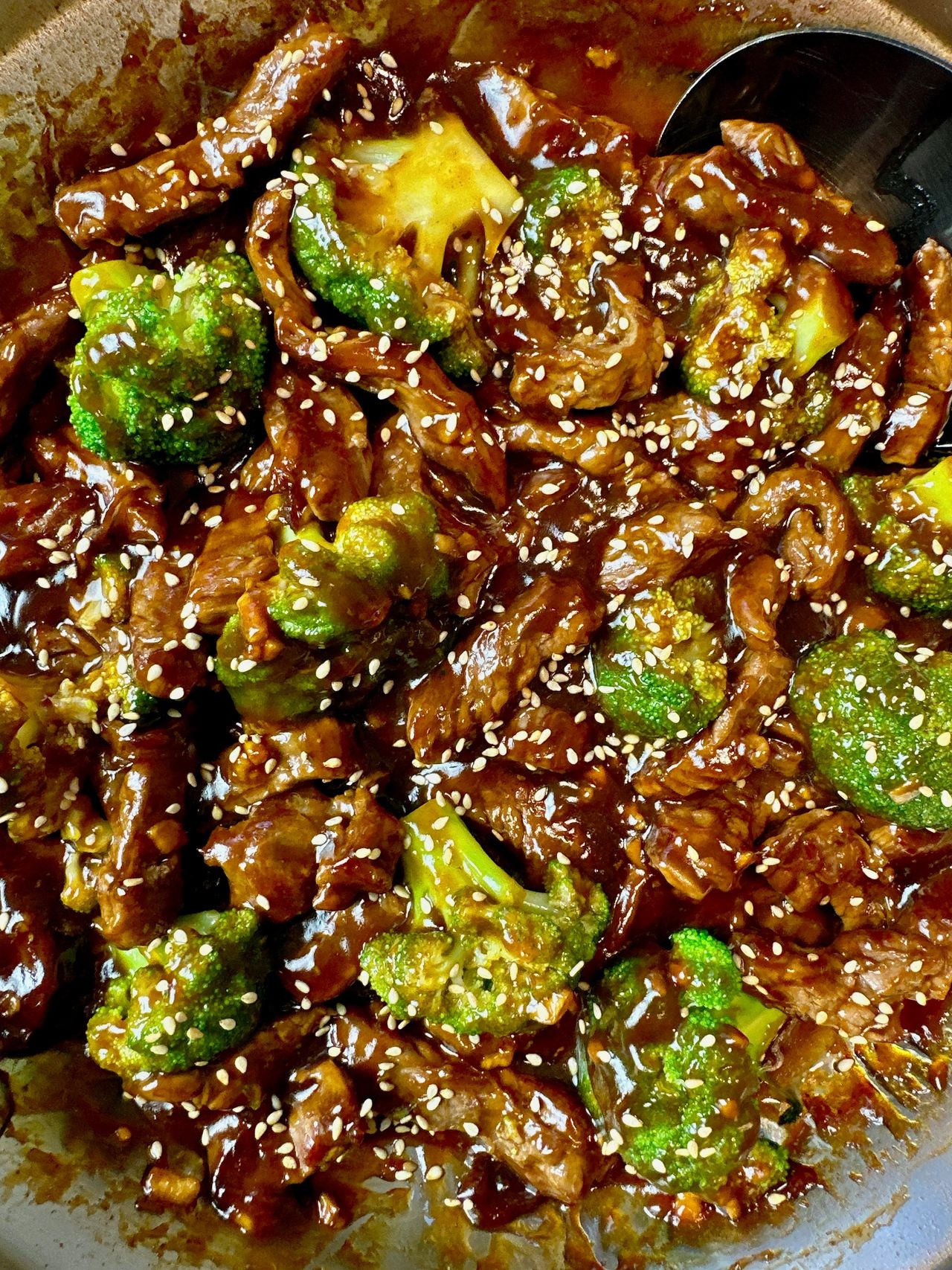 beef and broccoli in a skillet
