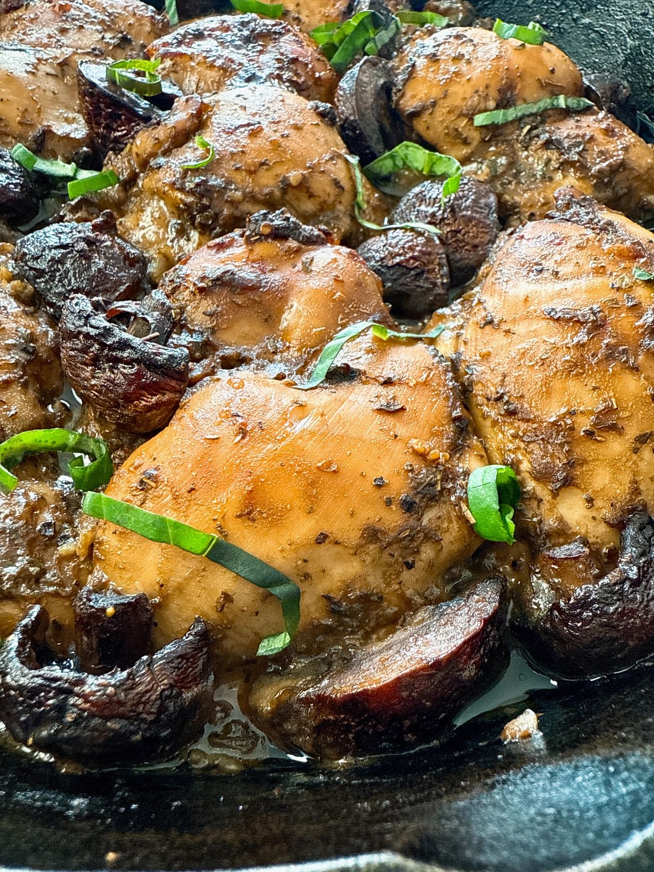 balsamic chicken and mushrooms in a cast iron skillet