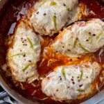 chicken with marinara sauce and cheese in a deep skillet