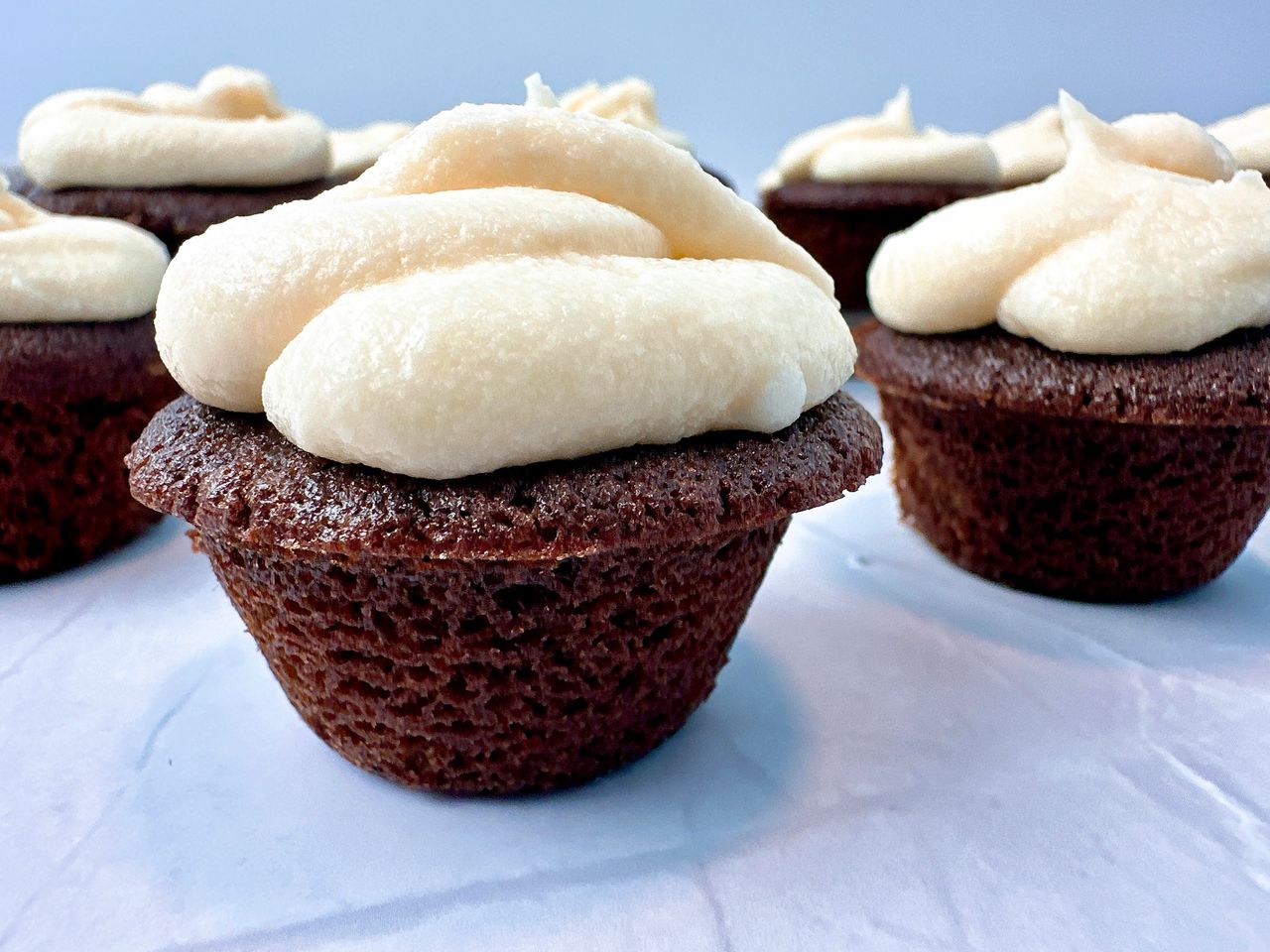 chocolate cupcakes with vanilla frosting