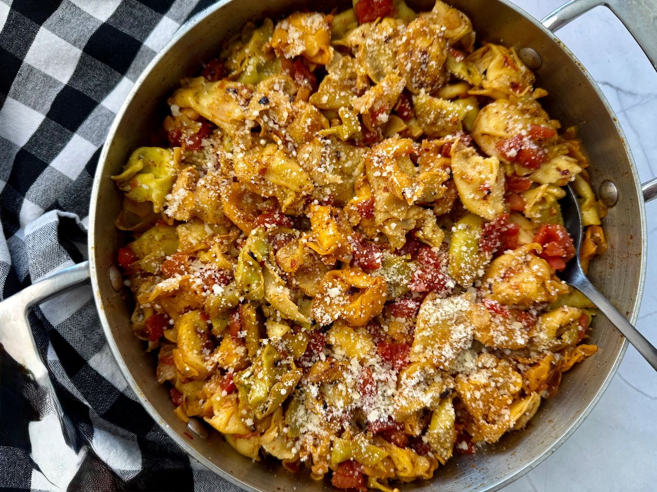 spicy tortellini in a skillet