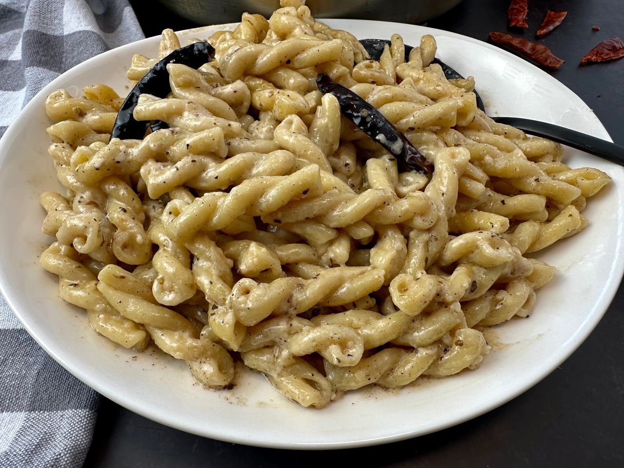 pasta with cream sauce and dried chilies
