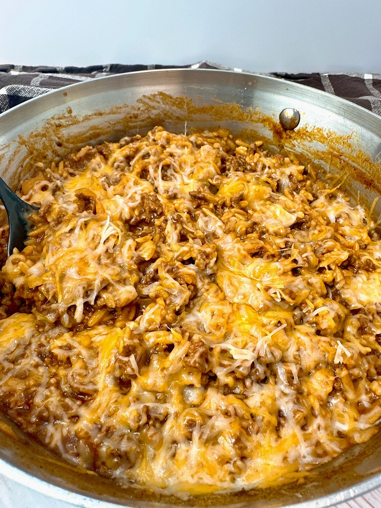 ground beef and pasta in a white bowl