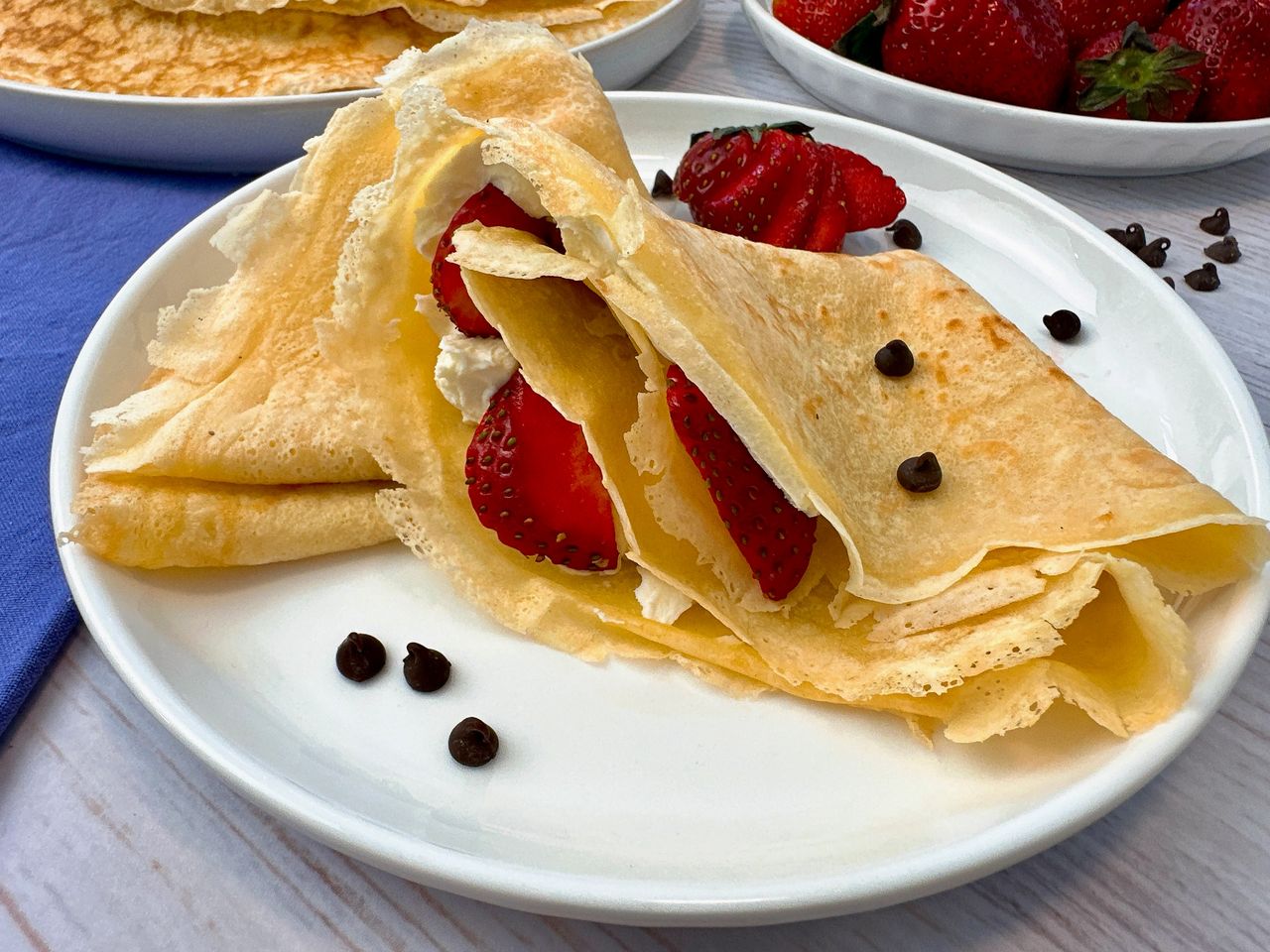 Crepes filled with mascarpone cheese and served with strawberries