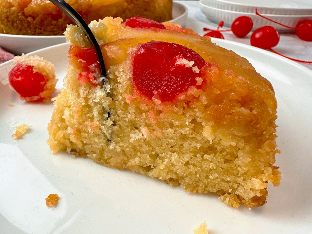 pineapple upside cake on a white plate