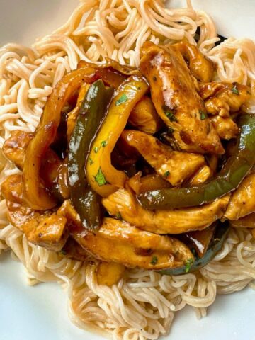 chicken stir fry over asian noodles