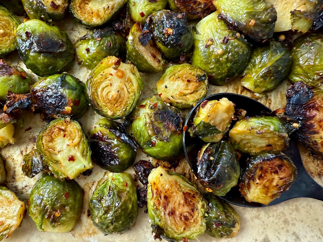 roasted brussels sprouts on parchment paper